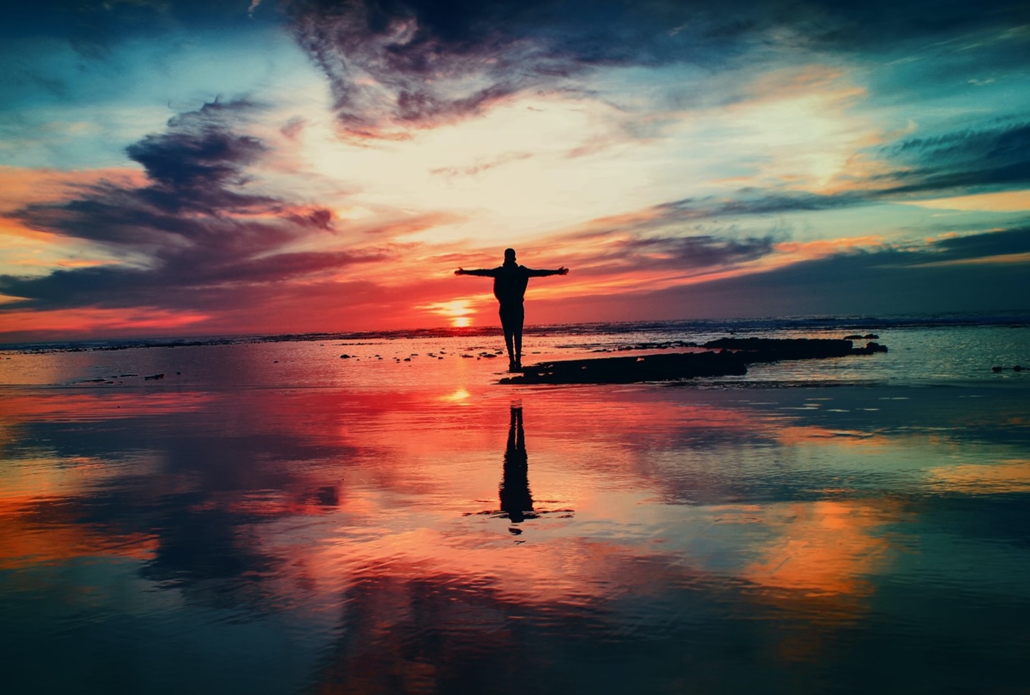 Inspirational Scene of Person Standing in a Sunset Sky Relieved from Spiritual Awakening